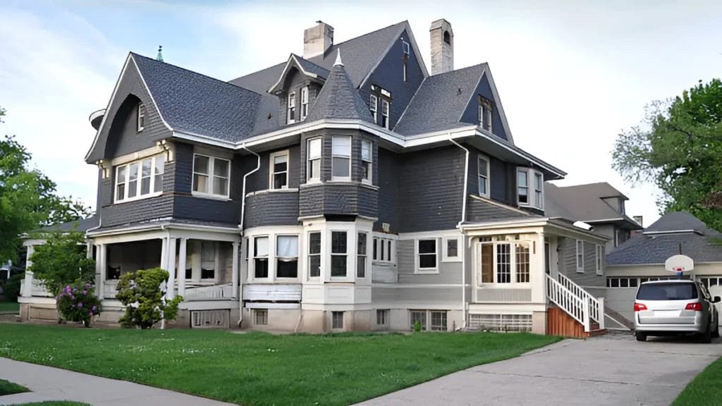 A photo of a row of Victorian-style homes with intricate detailing and bold colors